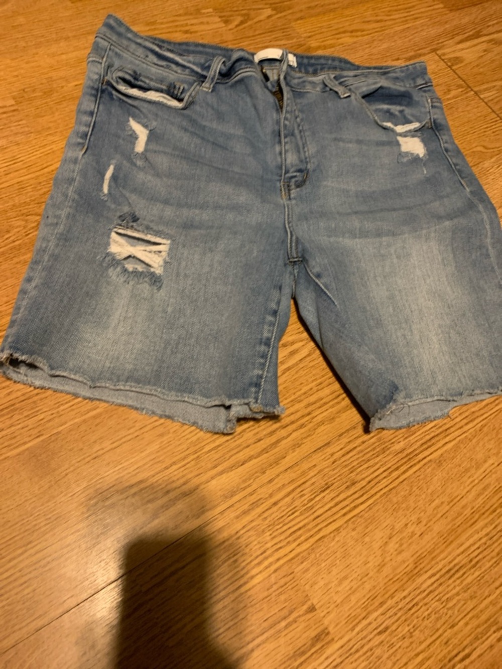 Women’s Light Blue Distressed Denim Shorts with Frayed Hem